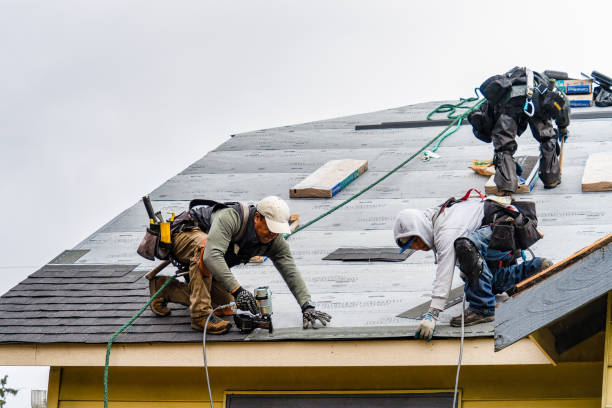Professional Gutter Installation technician working in Barre, MA